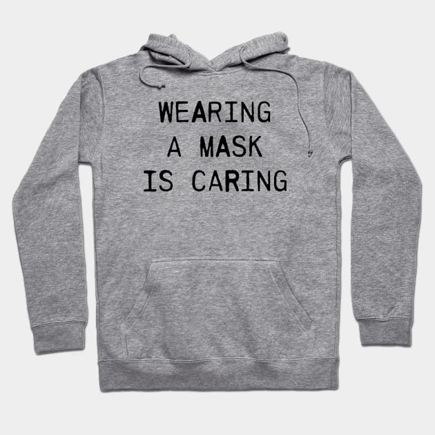 Wearing a mask is caring Hoodie by Howchie